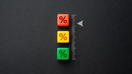 Arrow pointing to percentage symbols on dice