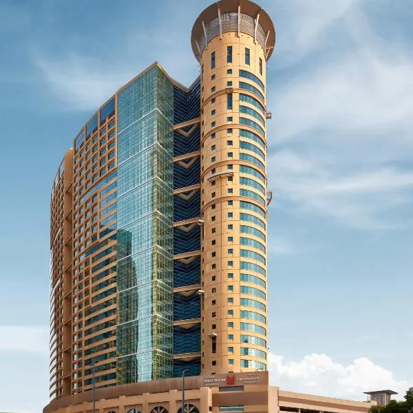 Grand Millennium Al Wahda Hotel and Executive Apartments Abu Dhabi, отель в Абу-Даби