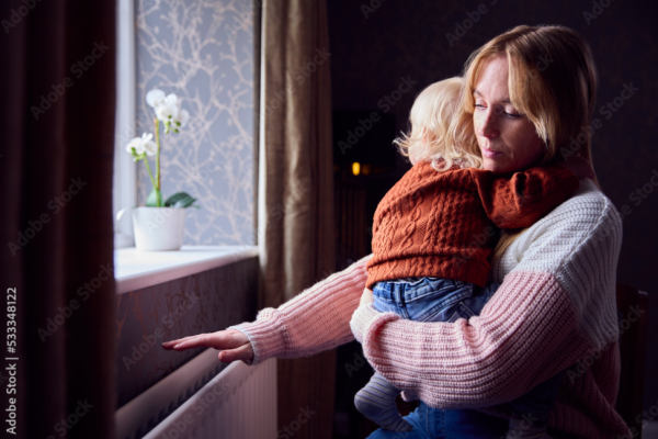 mother and daugther near the heating