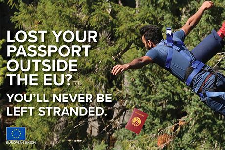 Man seen on his back while bungee jumping. His passport falls out of his pocket Trees seen in the back.  Text saying: Lost your passport outside the EU? You’ll never be left stranded.