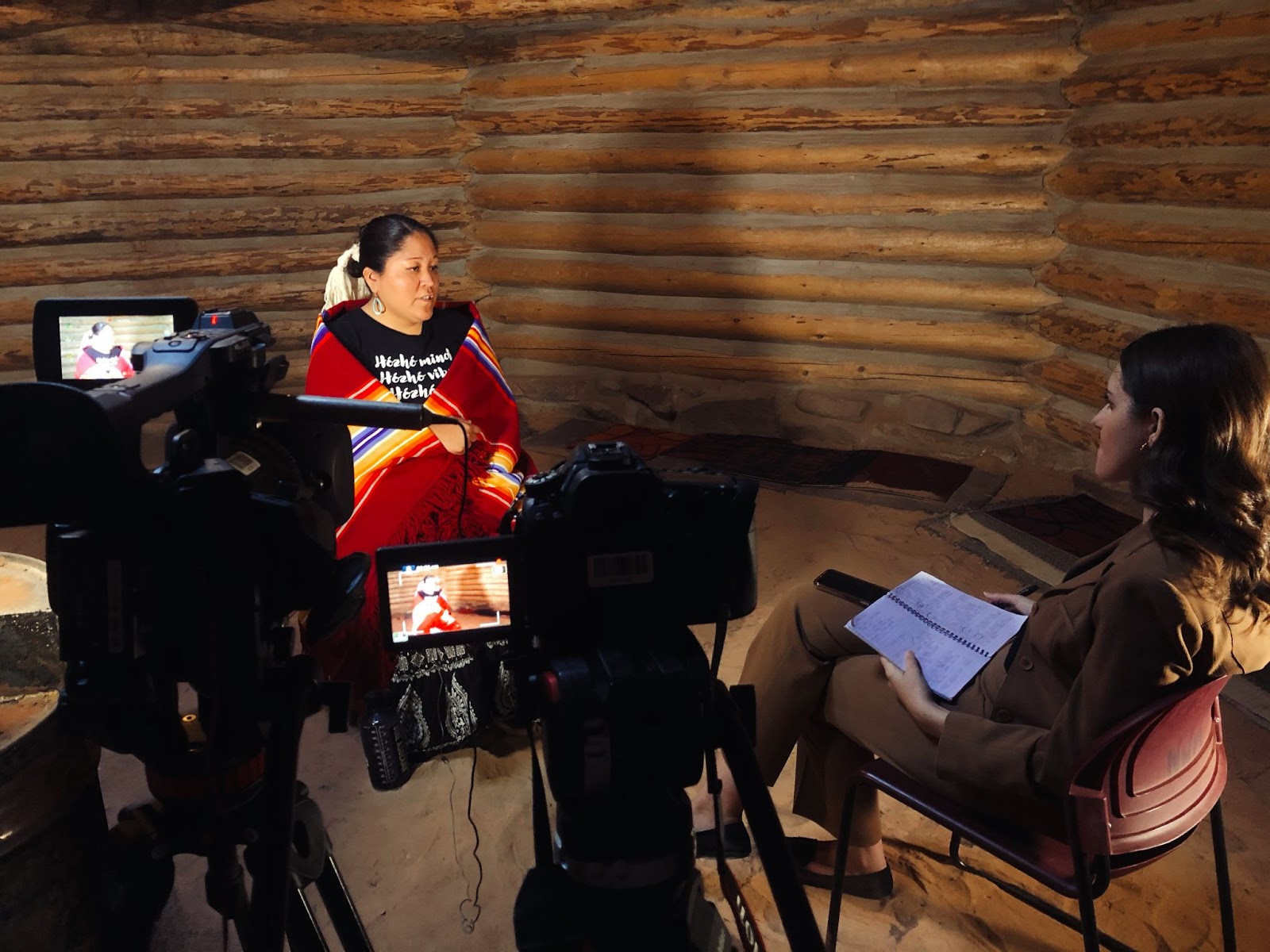 Cronkite students interview a Native American woman.