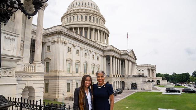 Senior Jordan Ford, left, stands with Congresswoman Joyce Beatty (D-Ohio) in front of the U.S. Capitol.