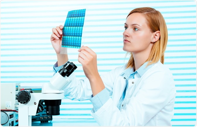 Silicon wafers production, photolithography. Image Credit: Science Photo / Shutterstock