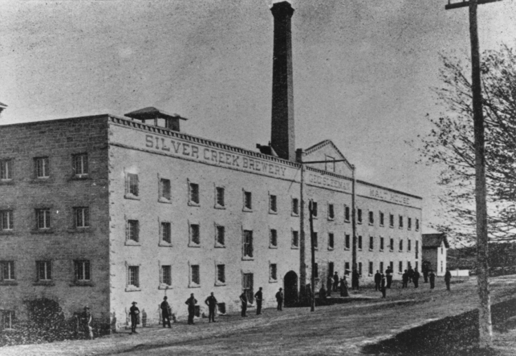 The Silver Creek Brewery was established by John Sleeman in Guelph in 1851. This photograph provides a view of the Silver Creek Brewery from Waterloo Avenue, 1889.