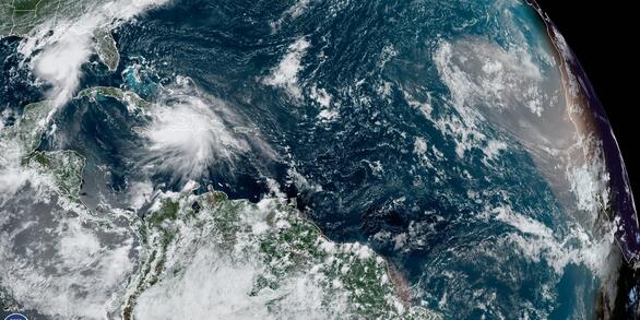 Hurricane Marco and Tropical Storm Laura in Atlantic Ocean