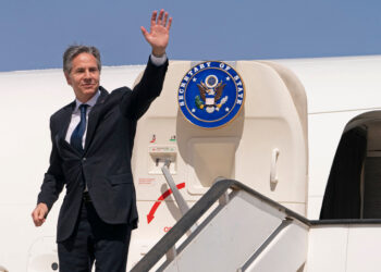 US Secretary of State Antony Blinken waves as he boards his flight to Morocco from the Israeli Nevatim Air force base in the Negev desert on March 28, 2022. (Photo by Jacquelyn MARTIN / POOL / AFP) (Photo by JACQUELYN MARTIN/POOL/AFP via Getty Images)