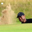 Tiefe Sandbunker machen den Profis zu schaffen: Tiger Woods geht bei den 152. British Open an den Start.