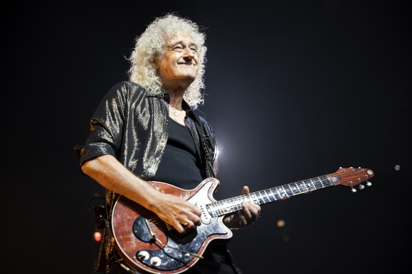 FILE - Brian May of Queen performs during the "Rhapsody" tour on Oct. 30, 2023, in Chicago. (Photo by Rob Grabowski/Invision/AP, File)