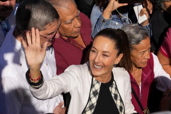 Ruling party presidential candidate Claudia Sheinbaum arrives to vote in general elections in Mexico City, Sunday, June 2, 2024. (AP Photo/Matias Delacroix)