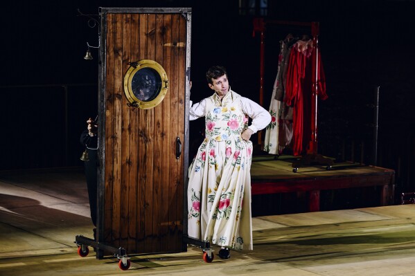 This image released by Little Island shows Anthony Roth Costanzo during a performance of "The Marriage of Figaro" in New York on Aug. 30, 2024. (Nina Westervelt/Little Island via AP)