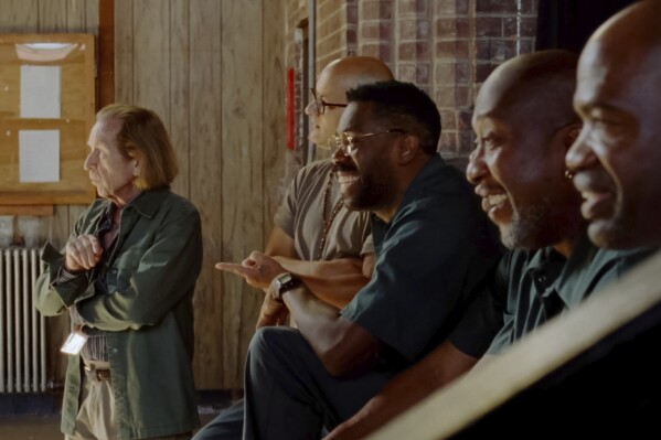 This image released by A24 shows, from left, Paul Raci, Sean San José, Colman Domingo, Sean “Dino” Johnson, and Mosi Eagle from "Sing Sing." (A24 via AP)