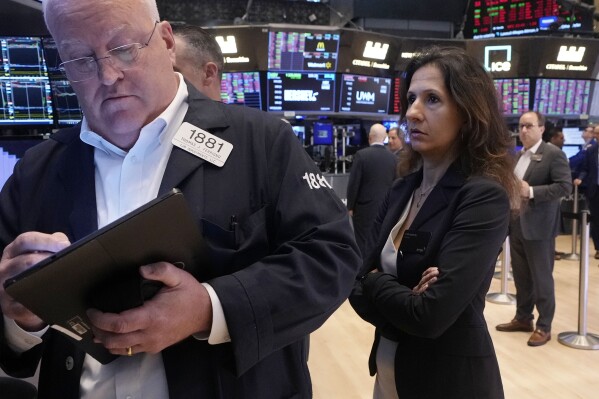 NYSE President Lynn Martin watches trading on the floor of the New York Stock Exchange, Monday, Aug. 5, 2024. (AP Photo/Richard Drew)