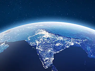 An illustration of India as seen by satellite at night.