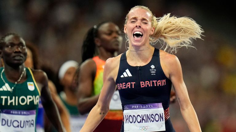 Keely Hodgkinson, of Britain, celebrates as she wins the women's 800-meters final at the 2024 Summer Olympics, Monday, Aug. 5, 2024, in Saint-Denis, France. (AP Photo/Petr David Josek)