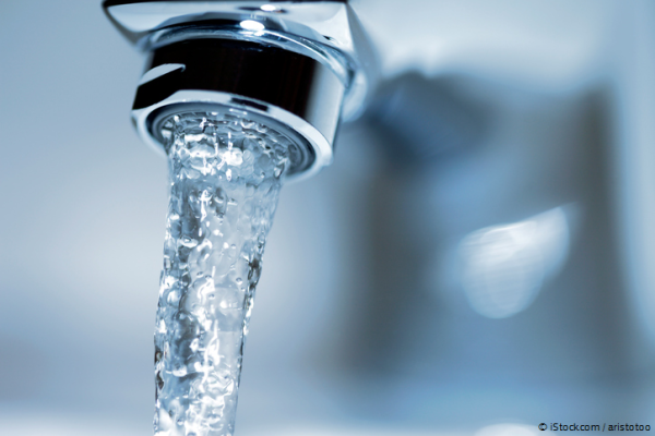 Water coming out of faucet.