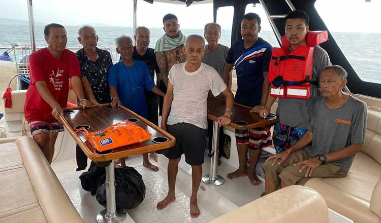 The 10 Thai ship crew members after being rescued on Sunday by Cambodian authorities. (Photo courtesy of The Khmer Times)