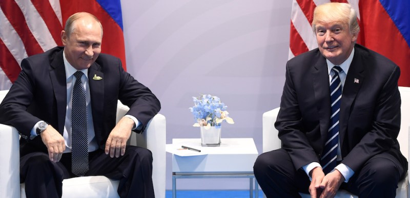 US President Donald Trump and Russia's President Vladimir Putin hold a meeting on the sidelines of the G20 Summit in Hamburg, Germany, on July 7, 2017. / AFP PHOTO / SAUL LOEB        (Photo credit should read SAUL LOEB/AFP/Getty Images)