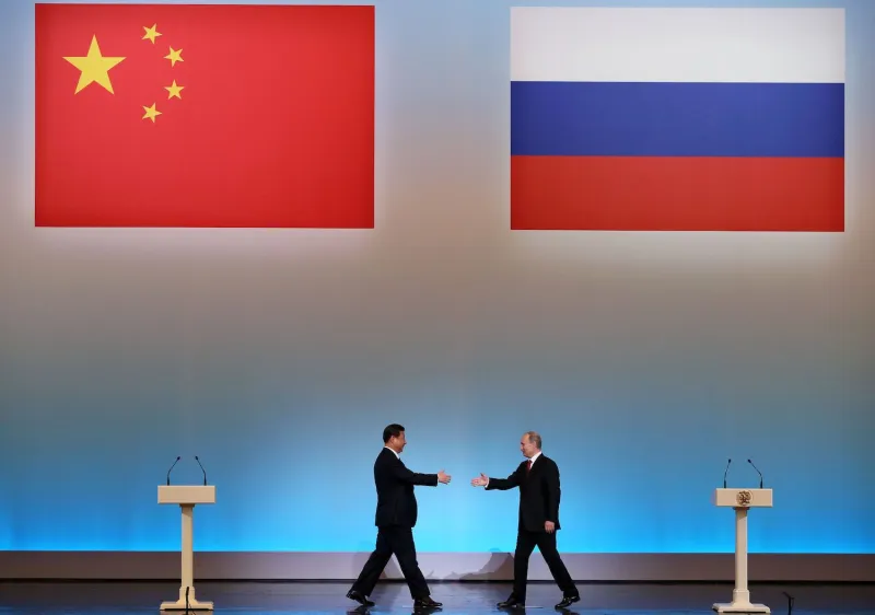 China’s President Xi Jinping is welcomed by his Russian counterpart, Vladimir Putin, in Moscow on March 22, 2013. (Sergei Ilnitsky/AFP/Getty Images)
