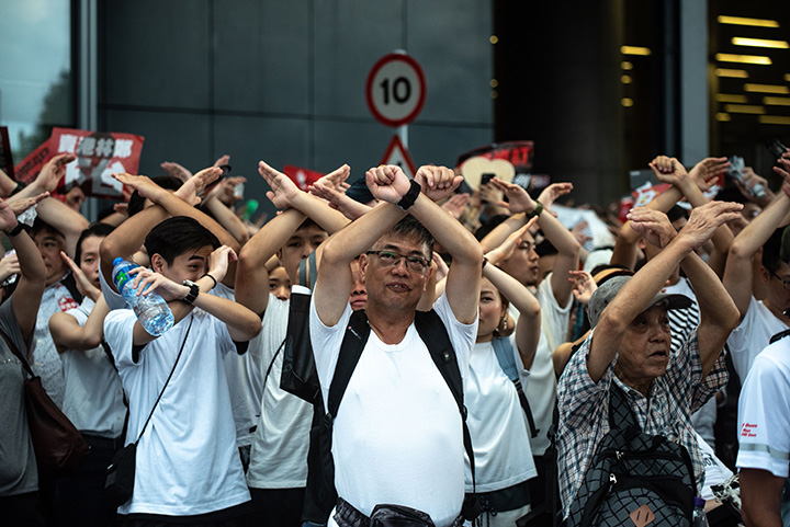 Protesters chant, "No extradition," as they rally against the controversial extradition law proposal in Hong Kong on June 9.