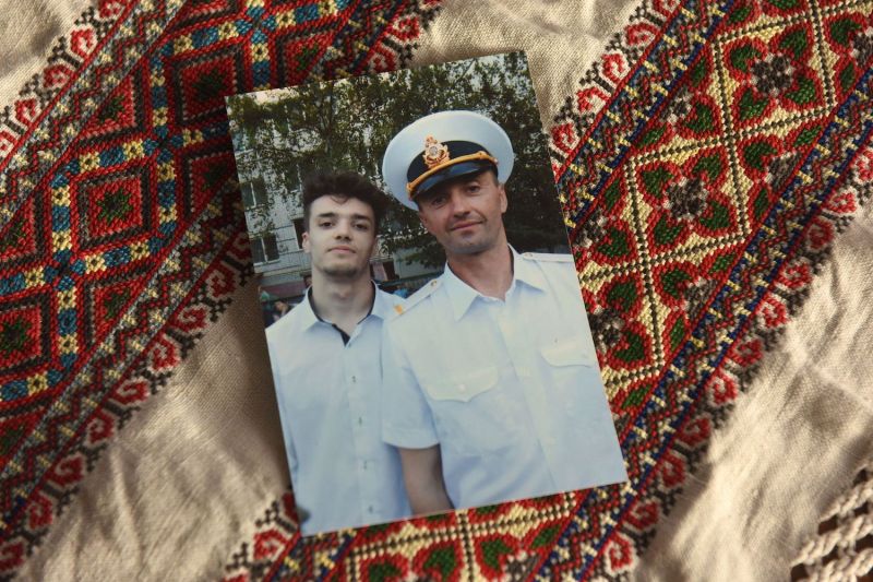 A family picture shows Andriy Oprysko, right, a 47-year-old seaman—one of 24 Ukrainian sailors who have been held captive by Moscow since the incident on the Kerch Strait—posing with his son, also named Andriy Oprysko.