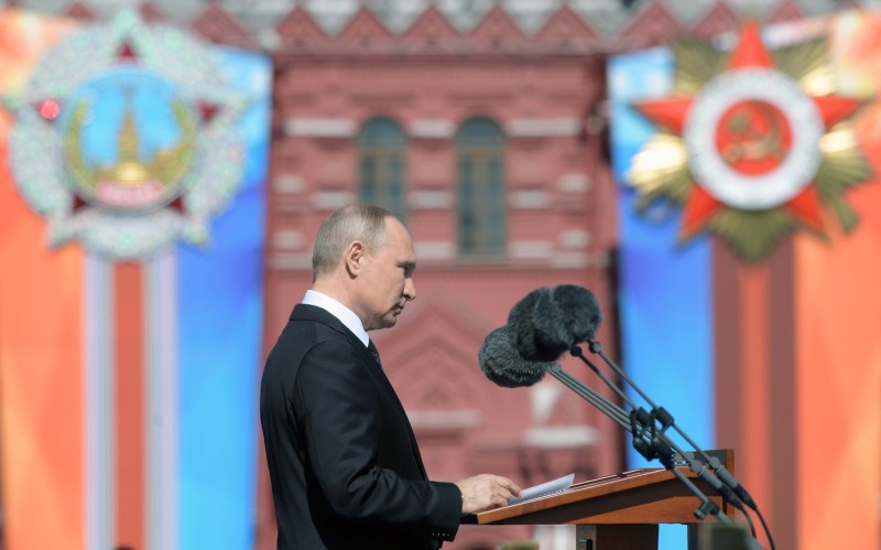 Russian President Vladimir Putin gives a speech during the Victory Day military parade at Red Square in Moscow on May 9, 2018.