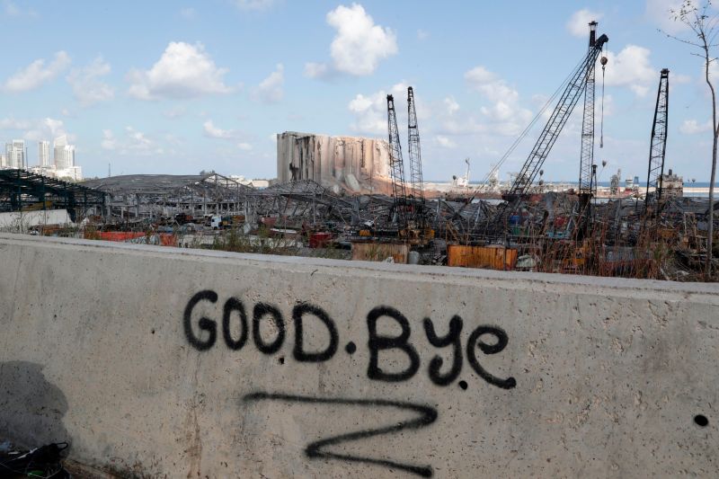 A picture taken on Aug. 9 shows graffiti on the wall of a bridge overlooking the port of Beirut, the site of the explosion which killed at least 154 people and devastated swathes of the capital.