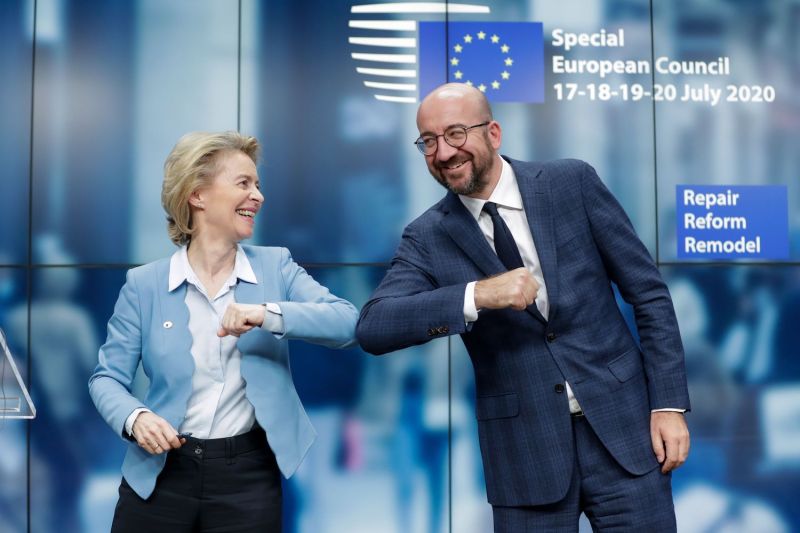 European Commission President Ursula von der Leyen and European Council President Charles Michel bump elbows at the end of a news conference in Brussels on July 21.