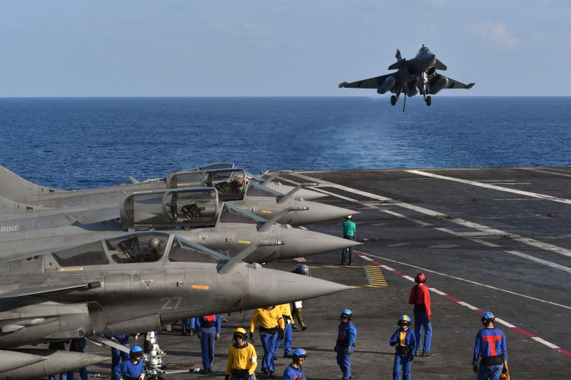 A French Rafale fighter jet prepares to land on the aircraft carrier "Charles de Gaulle" during a joint Indo-French naval exercise off Goa, India, on May 9, 2019.