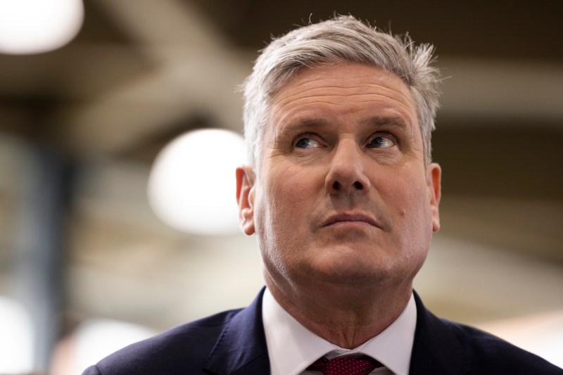 U.K. Labour Party leader Keir Starmer waits to be introduced on stage in Gillingham, England.