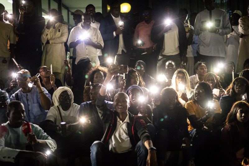 Members of the Senegalese media gather for a vigil to protest violence against the media, in Dakar on Feb. 12.