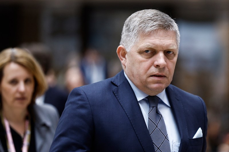 Slovakian Prime Minister Robert Fico walks during the European Council summit in Brussels.