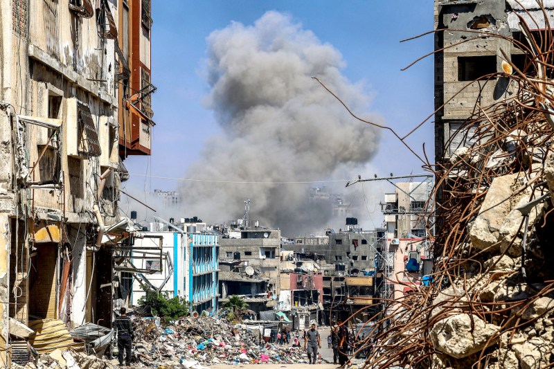 A smoke plume rises during an Israeli bombardment in the northern Gaza city of Jabalia.