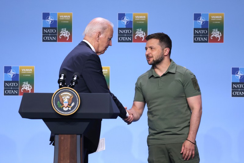 Ukrainian President Volodymyr Zelensky shakes hands with U.S. President Joe Biden following the announcement of a joint G-7 declaration in support of Ukraine in Vilnius, Lithuania, on July 12, 2023.