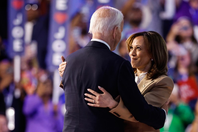 U.S. Vice President Kamala Harris and U.S. President Joe Biden greet each other at the end of the first day of the Democratic National Convention at the United Center in Chicago.