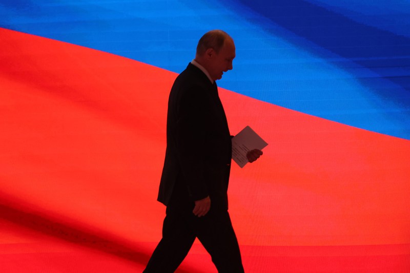 Russian President Vladimir Putin leaves a concert in Moscow.