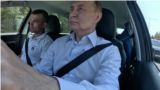 Владимир Путин осматривает трассу М-11 на Ладе Аура