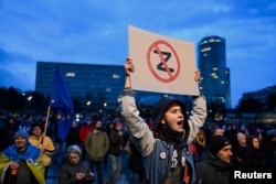 Участники акции протеста против пророссийской политики правительства Словакии. Братислава, март 2024 года