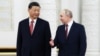 Президент России Владимир Путин с президентом Китая Си Цзиньпином во время официальной церемонии встречи в Большом Кремлевском дворце в Москве, 21 марта 2023 года.