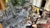 A view of rescue efforts from inside an apartment building hit by a Russian air strike in Kharkiv on September 24.