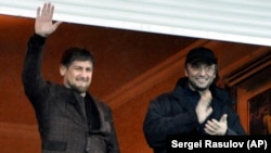 Рамзан Кадыров и Сулейман Керимов во время матча Кубка России по футболу в Грозном. 2011 год