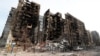 UKRAINE – A view shows an apartment building destroyed during Ukraine-Russia conflict in the besieged southern port city of Mariupol, Ukraine March 30, 2022