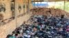 Waste from international clothing brands is stored before being used to fuel kilns at a brick factory on the outskirts of Phnom Penh, Cambodia November 17, 2023. (LICAHDO via REUTERS)