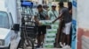 (FILE) Workers load boxes of beer to supply a private business in Havana, on June 6, 2023.