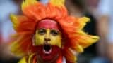 A Spain supporter cheers before the start of the UEFA Euro 2024 quarter-final football match between Spain and Germany at the Stuttgart Arena in Stuttgart.