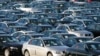 FILE - Imported German-made BMWs are parked at the North East Auto Terminal, Oct. 23, 2008, in Jersey City, N.J. BMW and two other automakers have used parts from a Chinese supplier banned in the U.S. for forced labor, congressional investigators said.