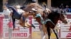 Eastan West of New Underwood, South Dakota gets bucked off the horse Geared Luxury in the novice saddle bronc event during the rodeo at the Calgary Stampede in Calgary, Alberta, Canada, July 8, 2024. 