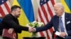 U.S. President Joe Biden shakes hands with Ukrainian President Volodymyr Zelenskyy in Paris, June 7, 2024.