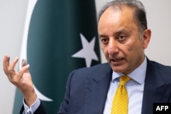 FILE - Pakistani Petroleum Minister Musadik Malik speaks during an interview with AFP at the Embassy of Pakistan in Washington, May 8, 2023.