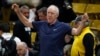 FILE - Television analyst Bill Walton stretches before the first half of an NCAA college basketball game between Oregon and Colorado, Jan. 2, 2020, in Boulder, Colorado. 