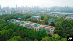 FILE - A view of a portion of the campus of Wuhan University in Wuhan, Hubei province, China, April 11, 2020. The number of American students studying in China has dropped dramatically in recent years. (AP File photo)